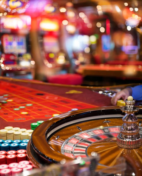 Mobile phone screen showing hacker slot Live Casino table lobby with multiple game options